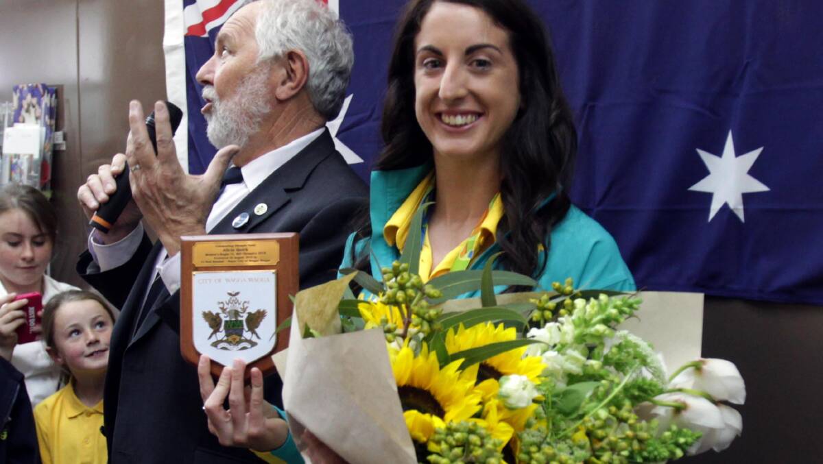 GREEN AND GOLD: Alicia Lucas (nee Quirk) has fond memories of her civic reception when she returned to wagga as an Olympic gold medal winner. Picture: Les Smith.