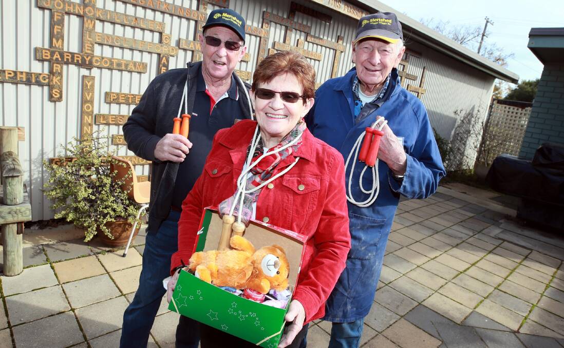 SKIPPING WITH JOY: Men's Shed Wagga president Tony Mason, Cheryl Stewart from Samaritan's Purse and Men's Shed member John Mason join forces. Picture: Les Smith