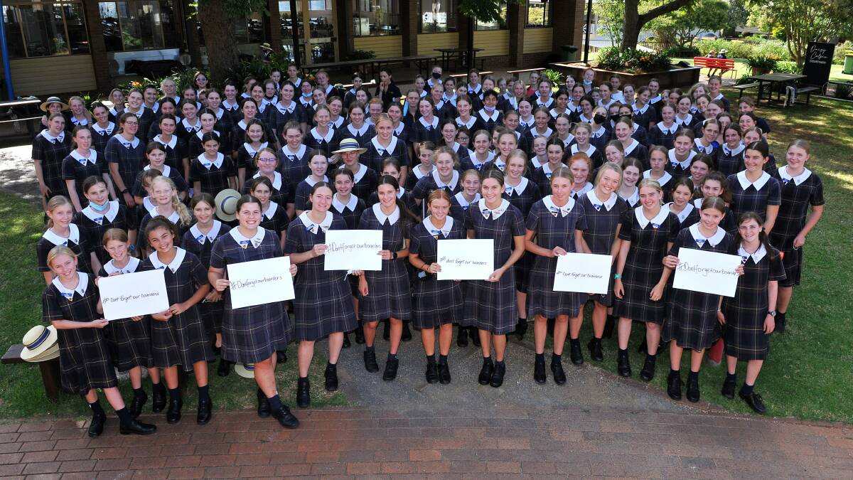 DON'T FORGET US: Fairholme College Toowoomba boarding students gathered on Monday to campaign for boarding house staff to be considered critically essential workers. Photo: Supplied