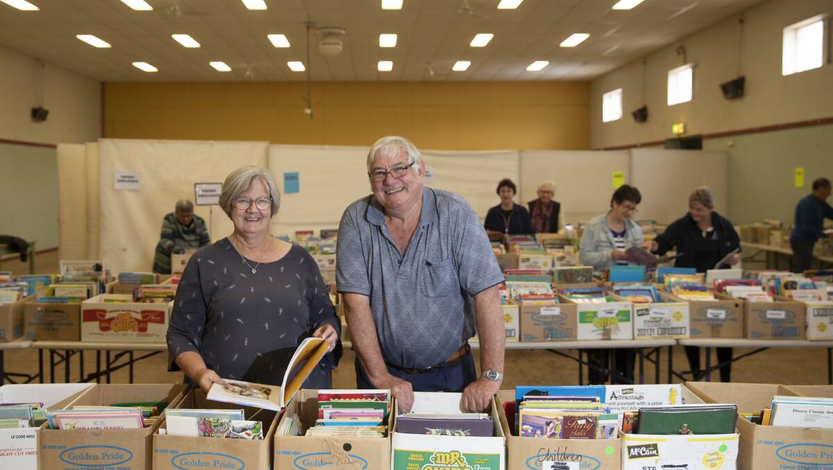 PAGE-TURNERS: Admin director Vicky Donoghue and coordinator Graham Russell ahead of this weekend's Rotary Book Fair at Kyeamba Smith Hall. Picture: Madeline Begley
