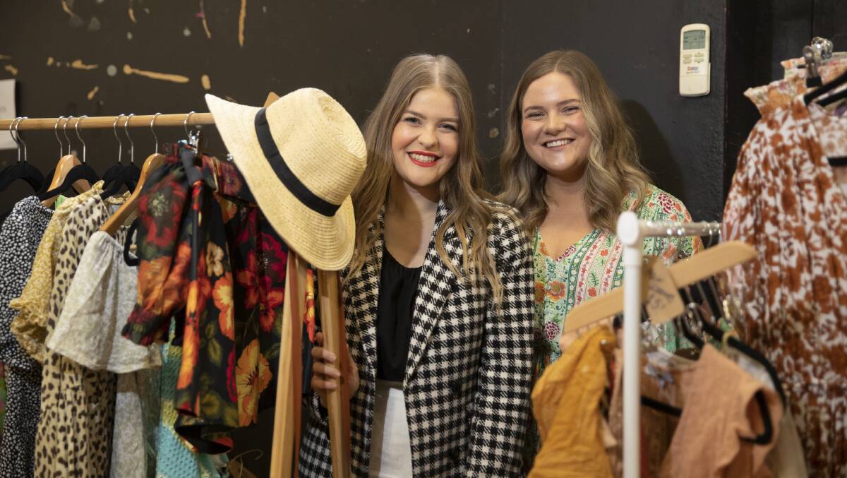 Anna and Rosie Chapman set up a stall at the inaugural Social Queen Markets on Fitzmaurice Street, which gave members the public the opportunity to sell preloved clothing. Picture: Madeline Begley