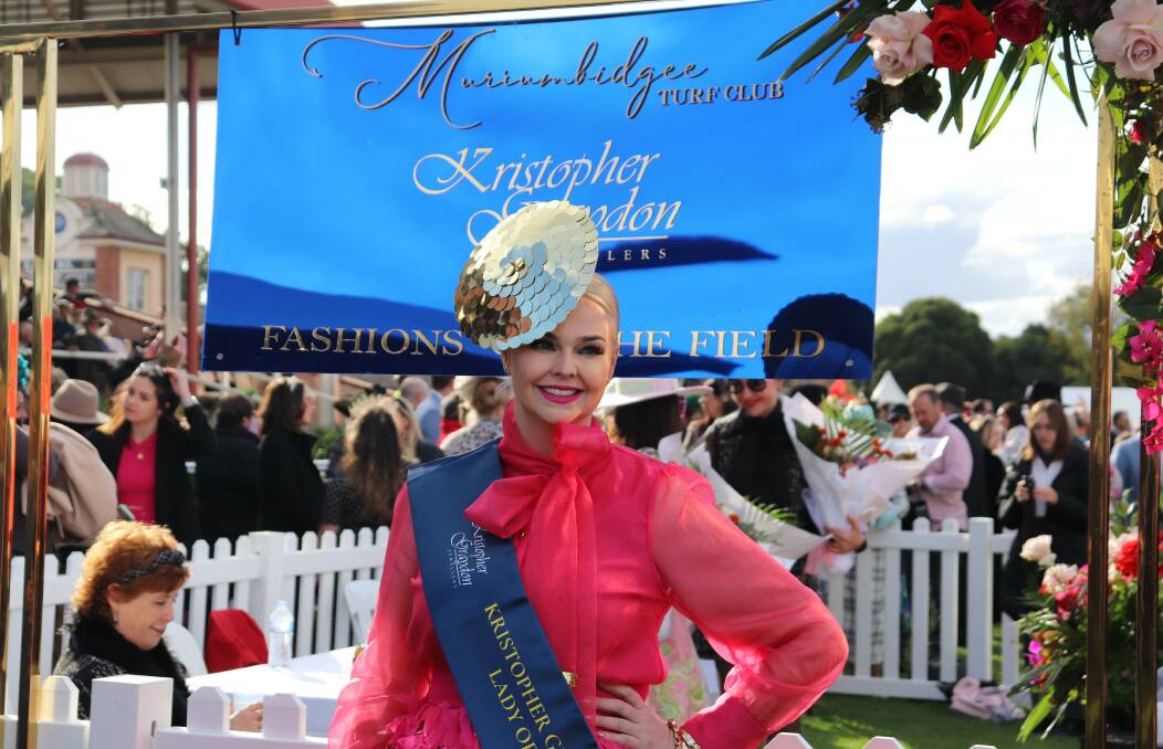 TOP GONG: Lady of the Day Daisy Armstrong captured the judges' attention with her hot pink blouse and skirt, paired with gold accessories. Picture: Hayley Wilkinson