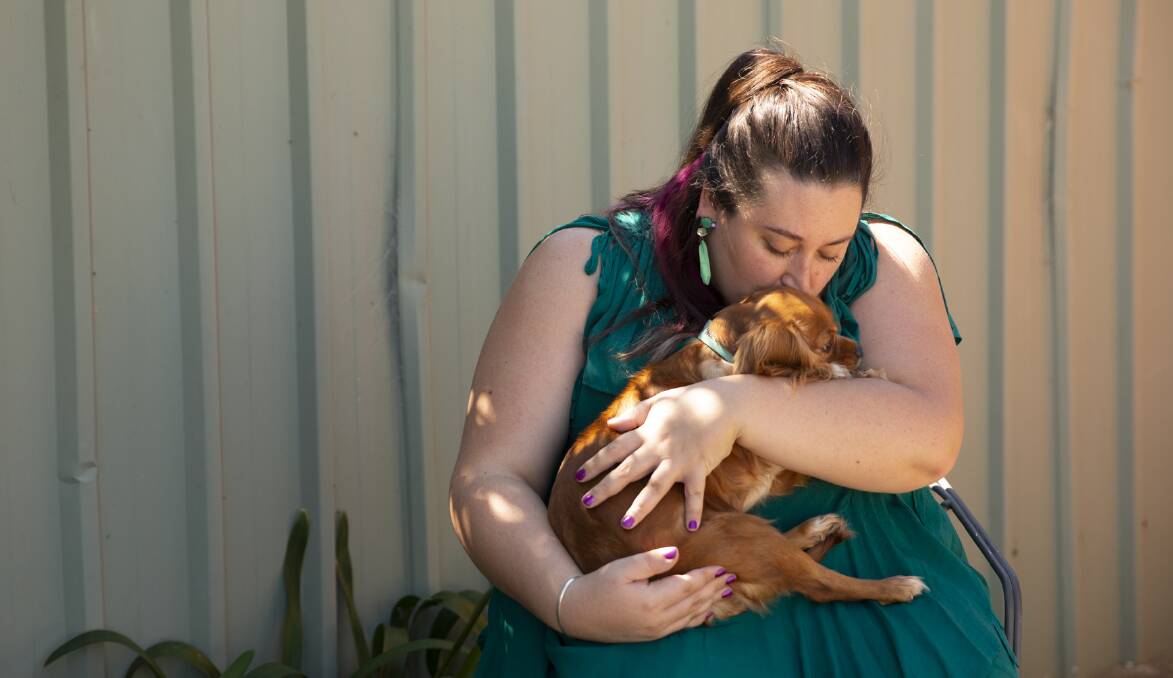 Riverina and District Animal Rescue (RADAR) president, Jessica Weir, and 5-year-old Dotty who was lopoking for a home earlier this year. Picture: Madeline Begley
