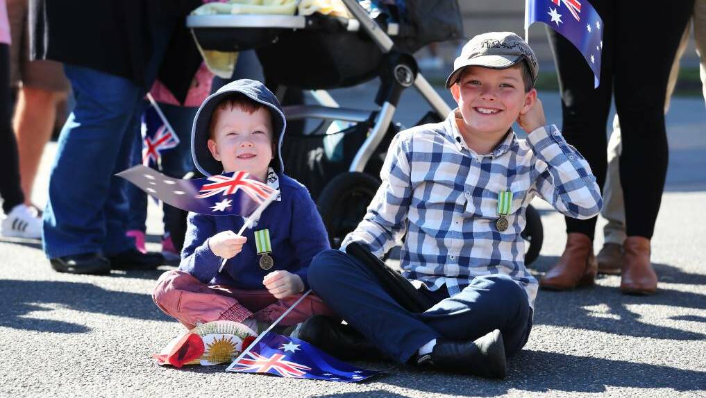 HIGH SPIRITS: Ronan, 5 and Declan McInnes, 9 from Wagga at last year's Anzac Day parade. 