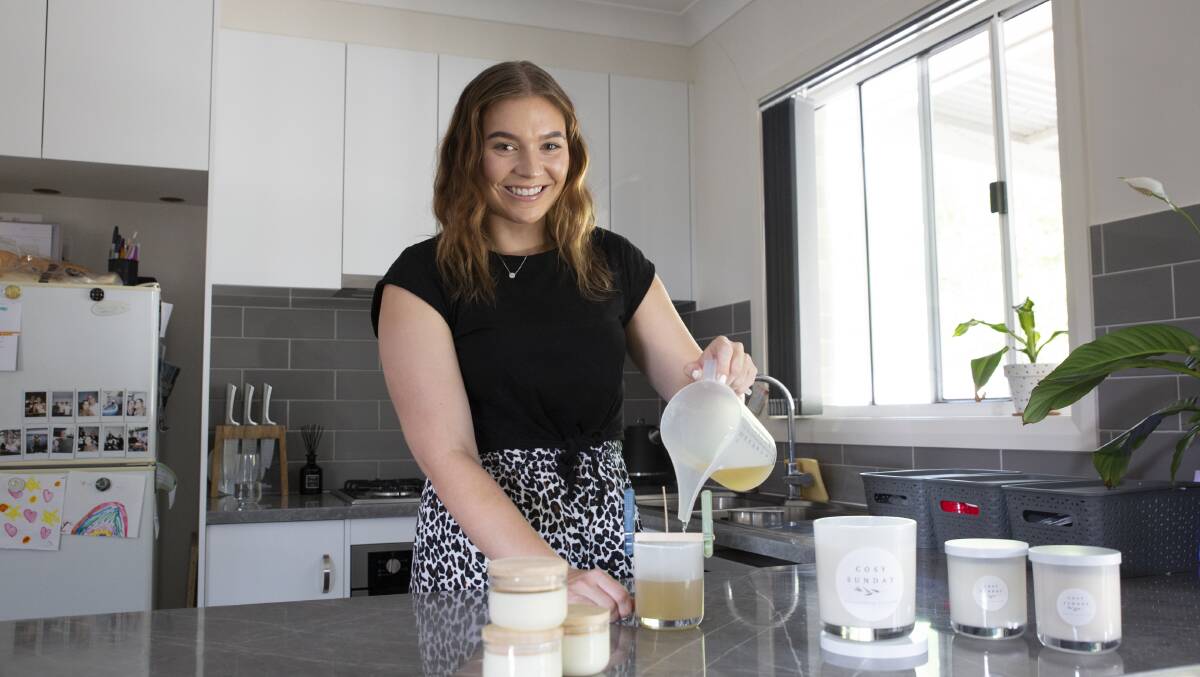 PASSION PROJECT: Education student Ella Purser's small candle business 'Cosy Sunday' serves not only as a income stream but a hobby she enjoys. Picture: Madeline Begley