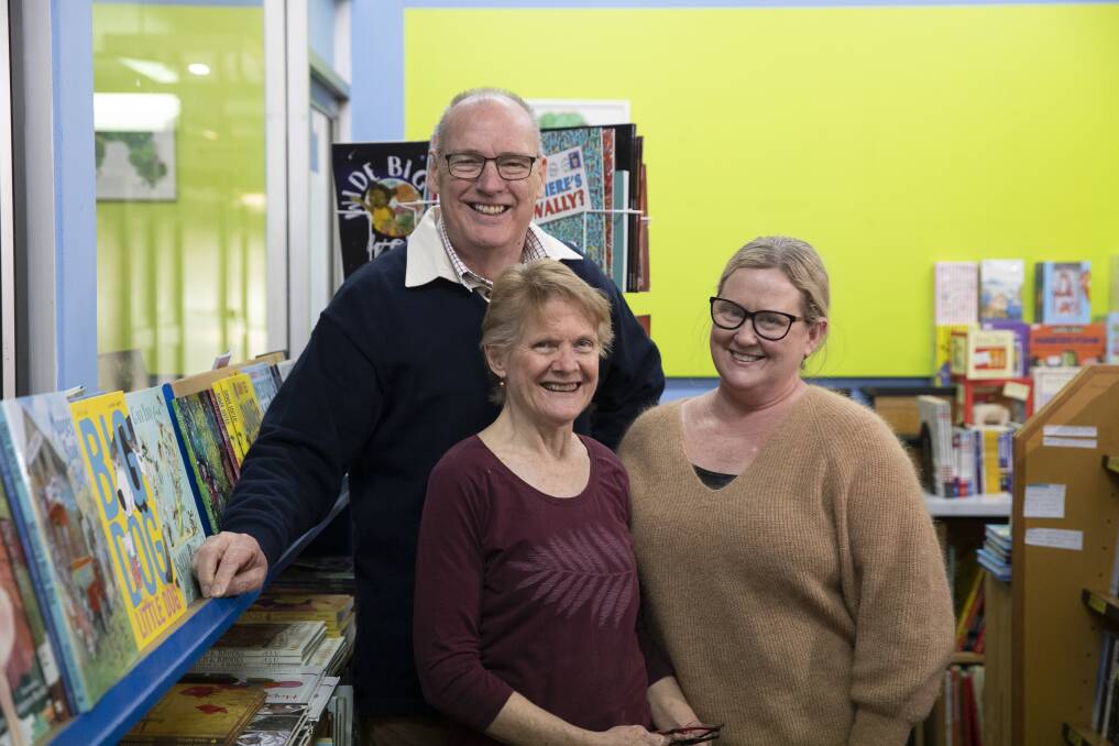 NEW CHAPTER: David and Fran Payne with the new owner of Gateway Bookshop Louise Blanchard at the South Town Walk store. The husband and wife duo had operated the bookshop together for 34 years. Picture: Madeline Begley