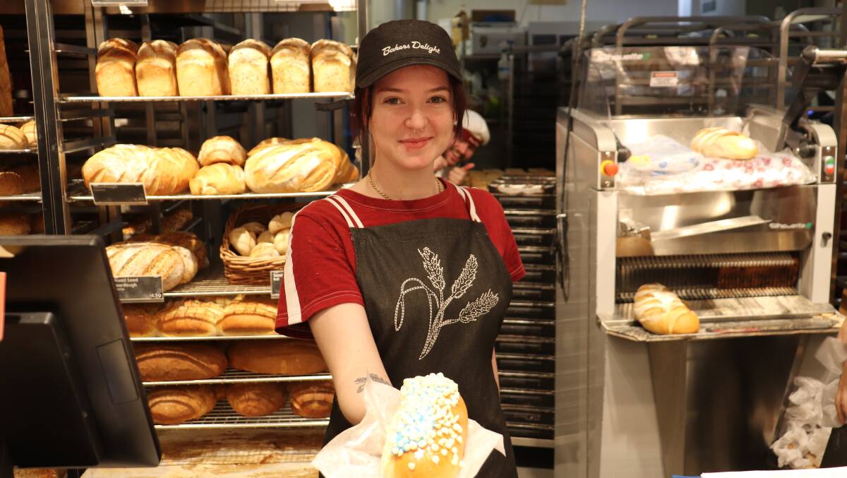 BAKED WITH LOVE: Grace Altoft from Baker's Delight who dedicated their finger buns's in honour of Sophia's favourite colours - with proceeds donated to the cause. Picture: Hayley Wilkinson