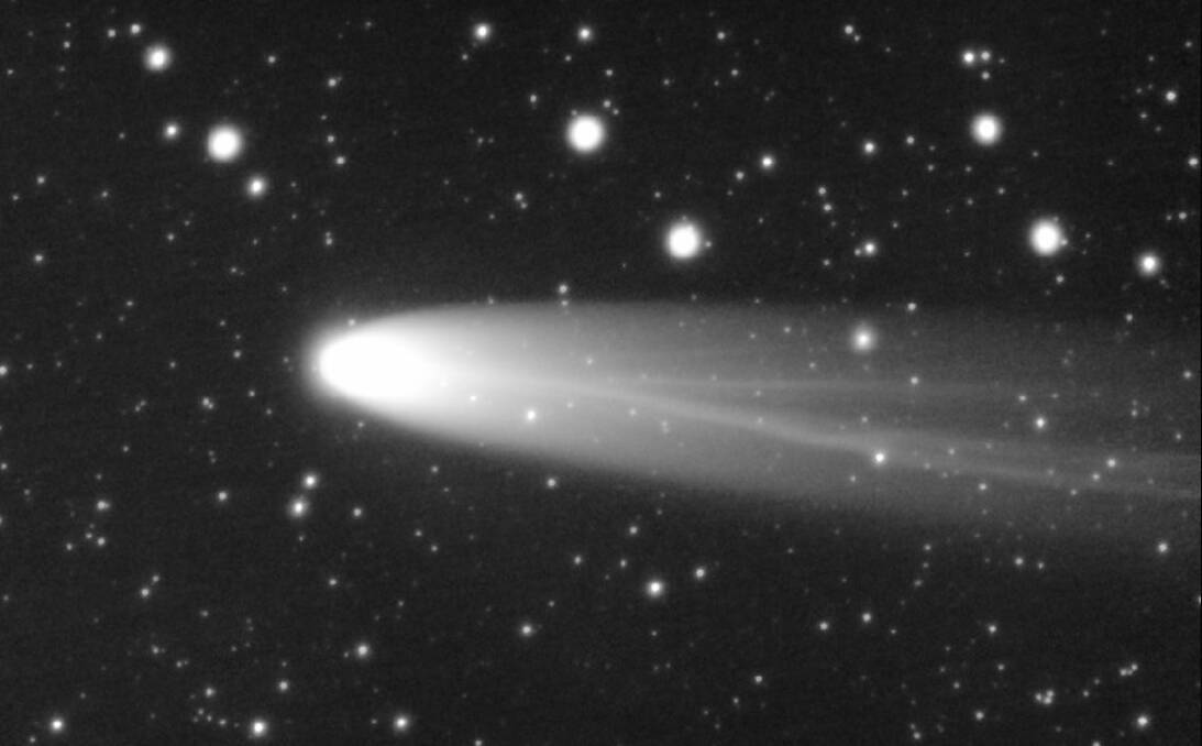 INTERSTELLAR: Astronomer Dr Graeme White photographed the soaring comet at Yathella, requiring 20 minutes of exposure time to capture both its head and tail. Picture: Supplied.
