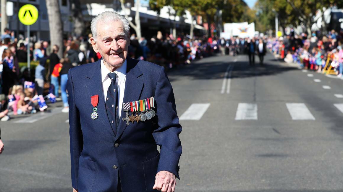 ANZAC DAY: A veteran marches down Bayliss Street during Wagga's 2021 Anzac Day parade. He heads towards the Victory Memorial Garden where the Anzac Day Service is to be held. 