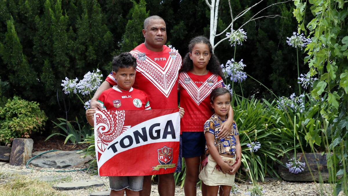 STRONGER TOGETHER: Sione Fekeila with his children, Cruz, 9, Sienna, 12 and Ava, 7. Picture: Les Smith.