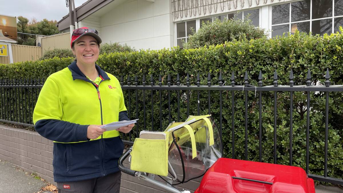 ON THE BEAT: Erin Devlin is the last Wagga postie to walk a beat, delivering post to people all along Wagga's main street. Picture: Conor Burke