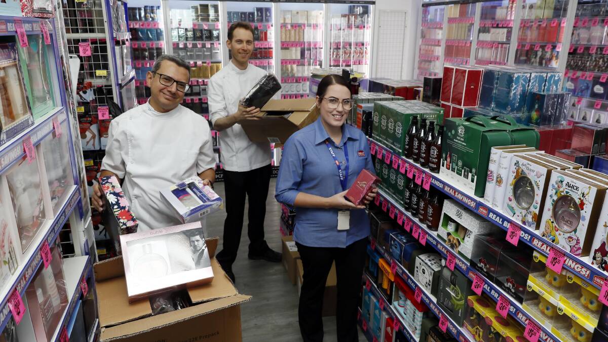 Chemist Warehouse at Boorooma staff Ramy Gerais, Kyren Bateman and Gabrielle Benett working double-time to get Wagga's newest pharmacy ready for it's grand openning. Picture by Les Smith