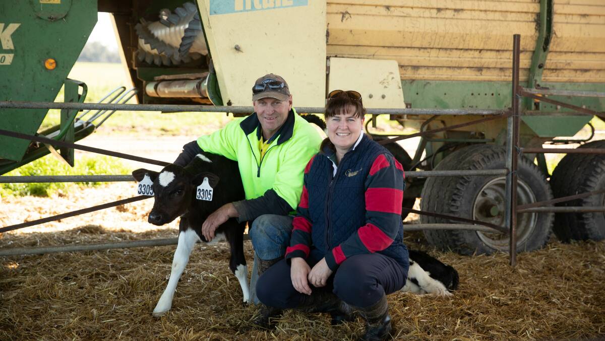FAMILY: Neil and Simone Jolliffe posing with one of their newest heifers. Picture: Madeline Begley 