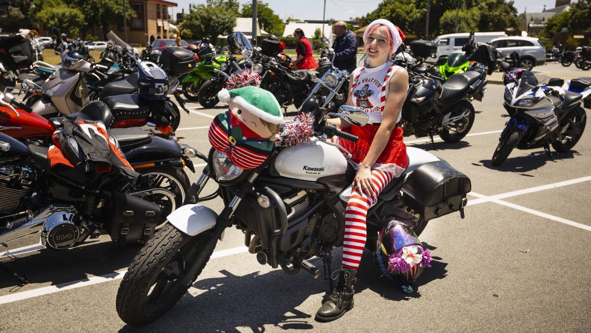 Kiya Makeham looking festive astride her Kawasaki Vulcan 650. THis was her second Toy ride. Picture by Ash Smith