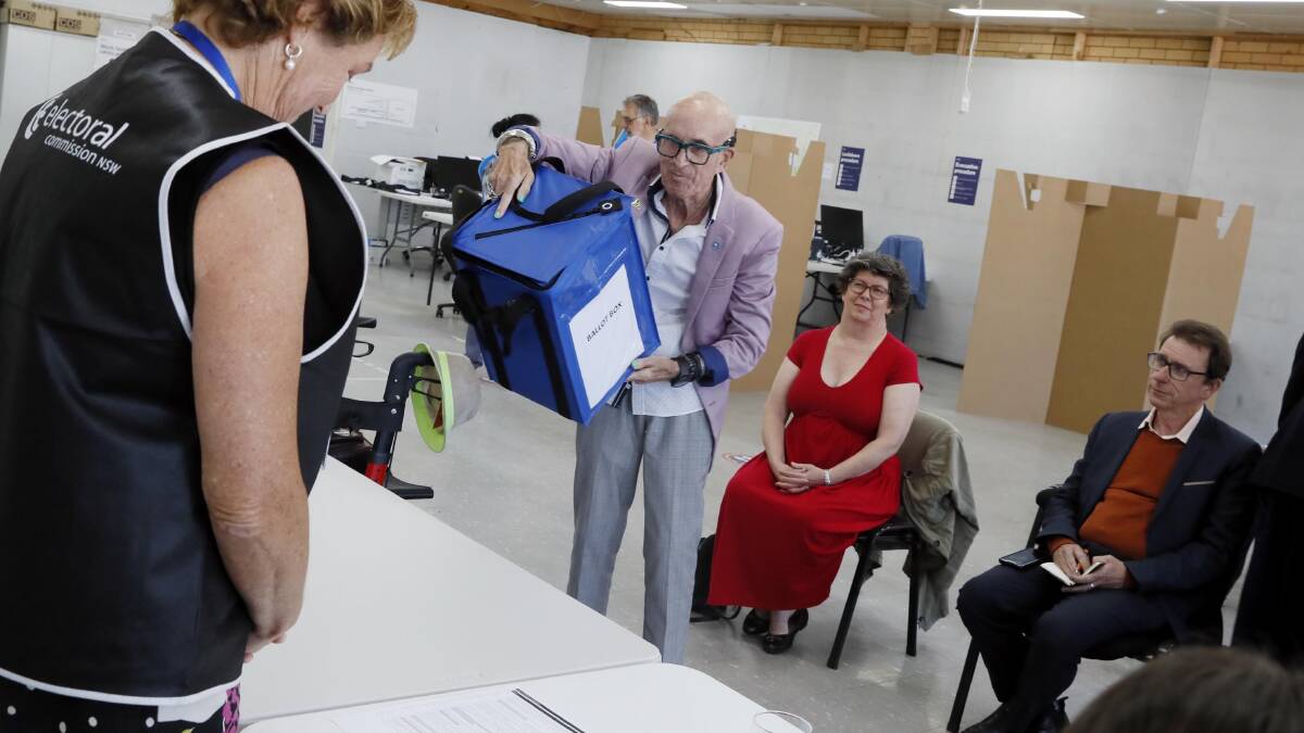 Greens candidate shakes up the ballot box before snaring top spot on the voting card for the 2023 state election. Picture by Les Smith