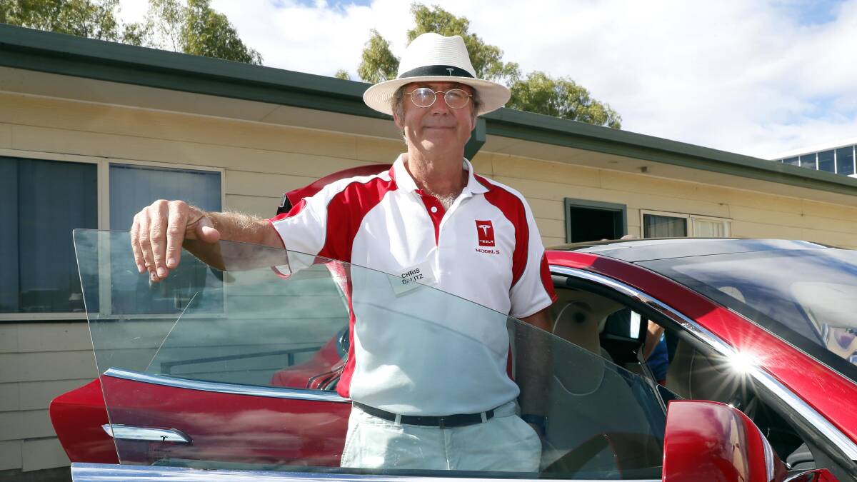 REVOLT: Riverina Electric Vehicle Owners Likers Testers group founder Chris Dalitz with his Tesla Model S 85D. He says government needs to change it's rhetoric around EVs for supply to increase. Picture: Les Smith