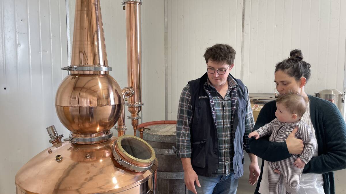 COMMUNITY FEEL: Jake, Tess and Harriet inspect the still at their new Distillery at Borambola winery. 