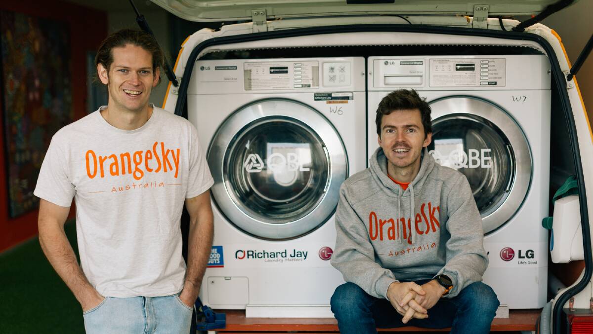 MEN WITH A VAN: Orange Sky founders Lucas Patchett (left) and Nic Marchesi will be launching a new service, 'The Laundry of the Furture', in Wagga. Picture: Contributed 