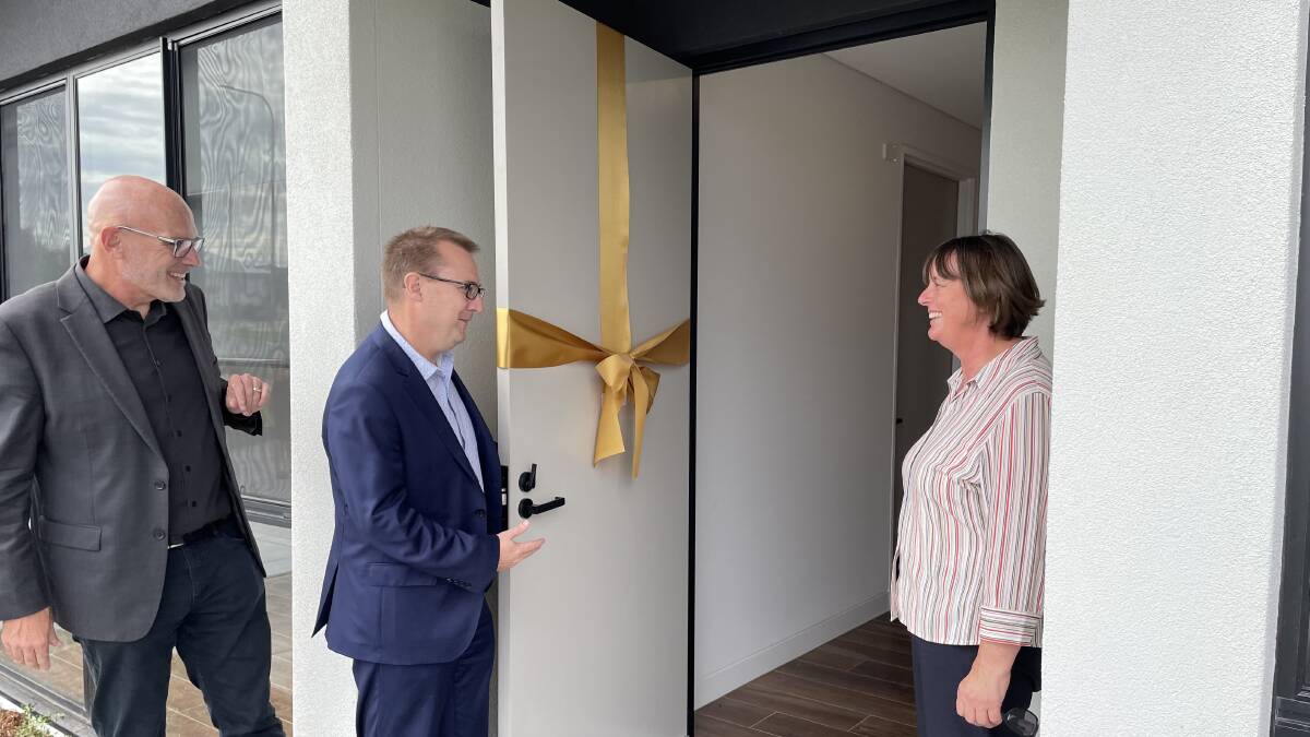 NEW BEGINNING: Deb Bewick (right) inspects the state-of-the-art home her daughter Monique hopes to move into alongside Northcott COO Andrew Kew (middle) and Casa Capace CEO Michael Fuller.