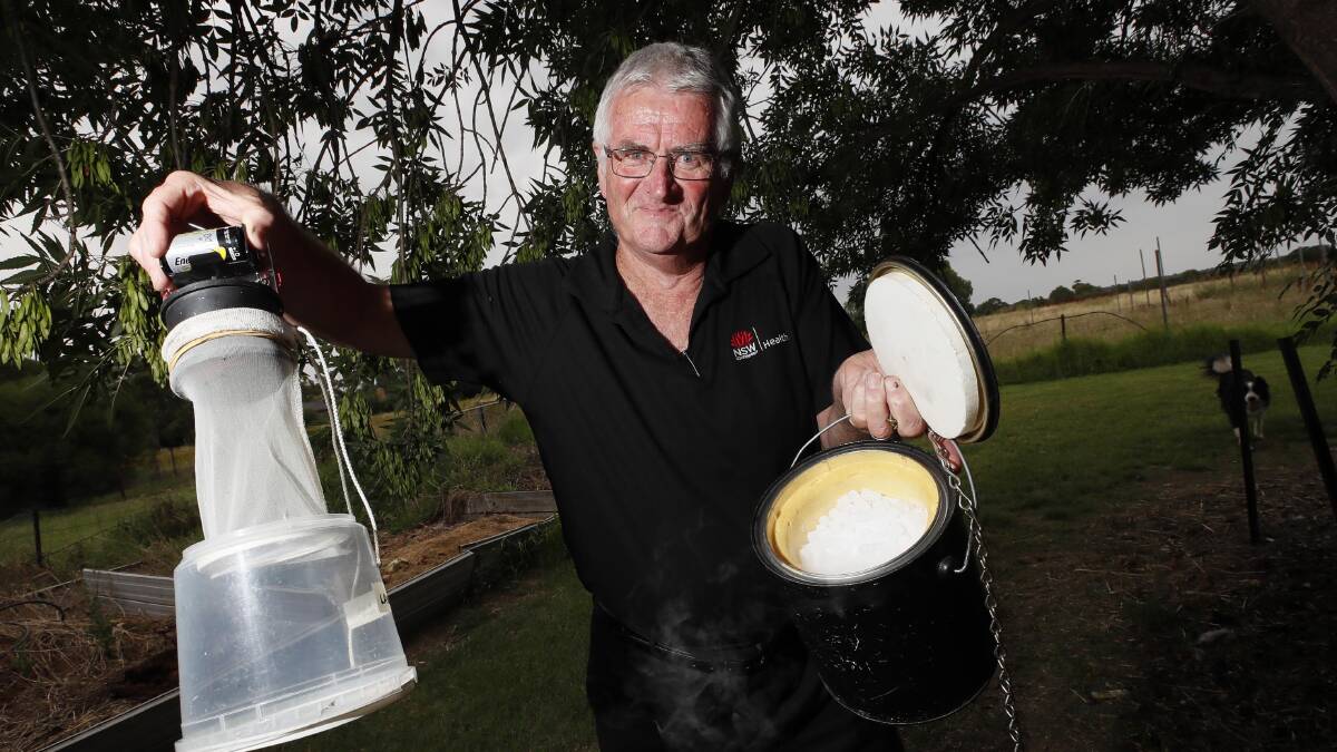 ITCHY BUSINESS: MLHD senior environmental health officer Tony Burns sets mozzie traps to determine the species irritating residents. Picture: Les Smith