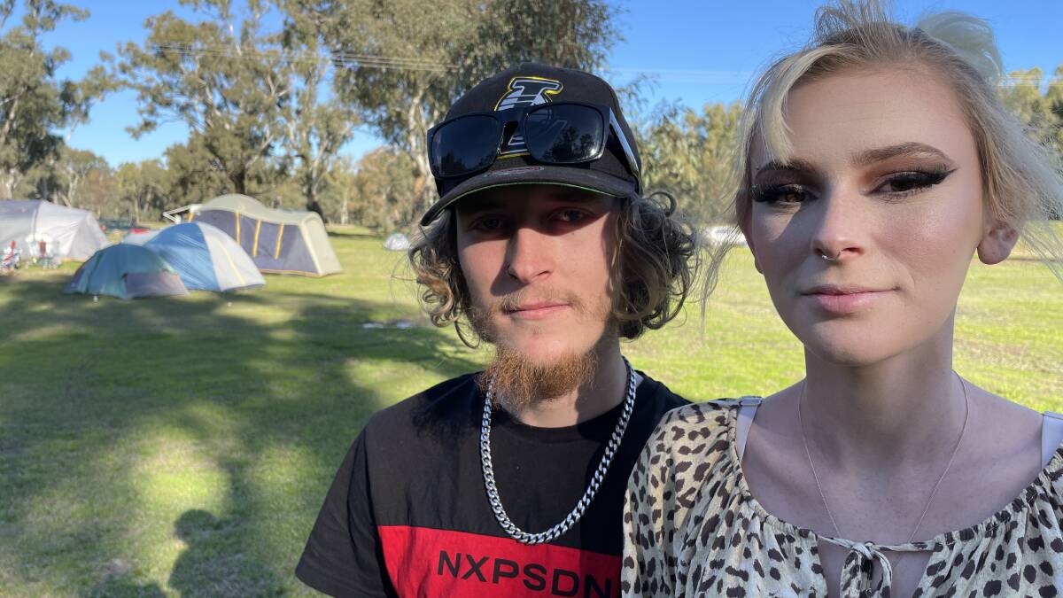 'ANYTHING BUT A TENT': Jason Bonwick, 21, and Georgia Bates, 19, are some of Wilks Park's youngest residents and now have the choice to stay put. Picture: Conor Burke 