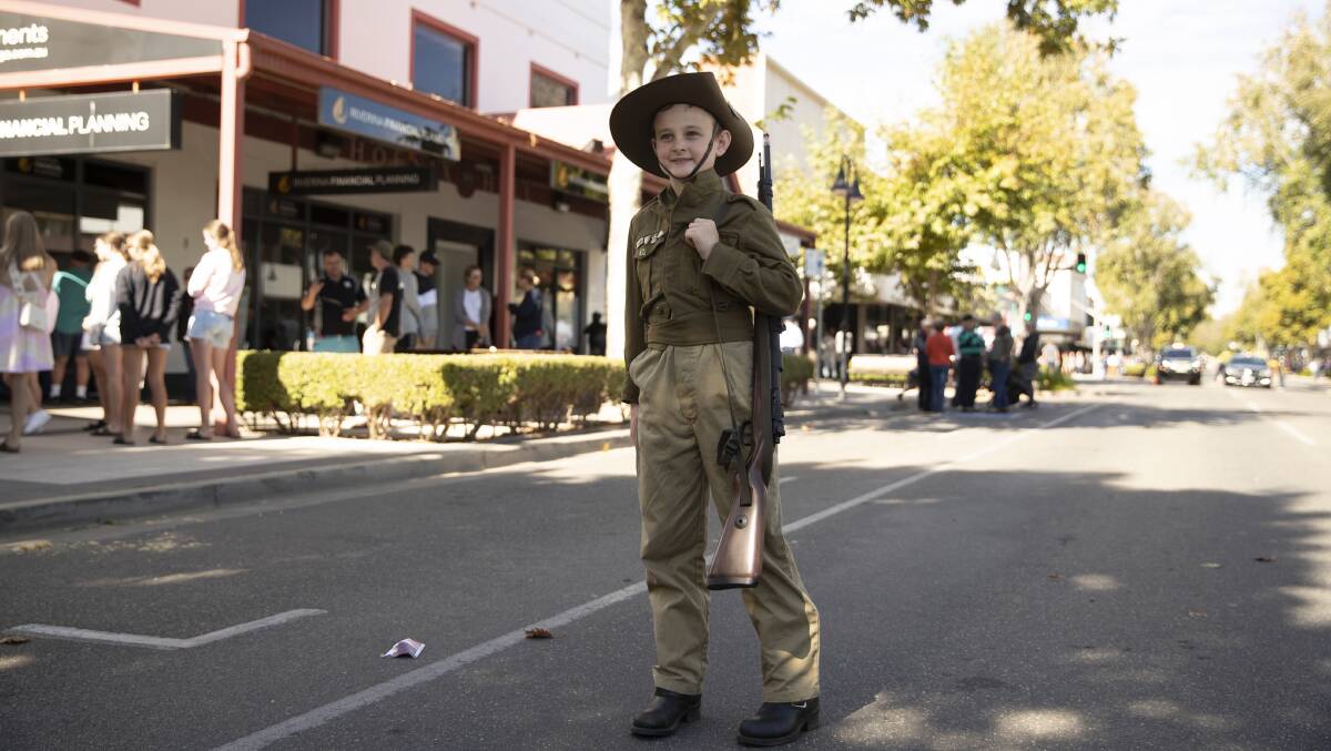 SPECIAL DAY: Edward 'Ted' Suttie, 10, after the Anzac Day parade on Baylis Street. He plays the trumpet so he can honour his fallen ancestors. Picture: Madeline Begley