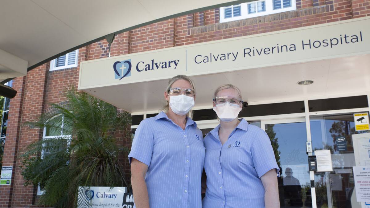 KEEPING IT IN THE FAMILY: Nurse and midwife, Belinda McDonell, with graduate nurse and daughter Izzey Hart at Calvary Riverina Hospital, where they now both work. Picture: Madeline Begley