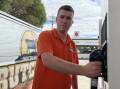 UNAVOIDABLE: South Wagga butcher Liam Hanigan fills up his delivery van as the price of regular unleaded hits $2 per litre. Picture: Angus Thomson