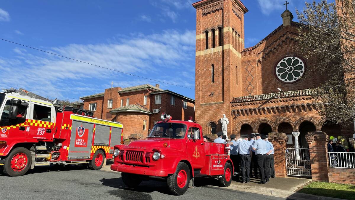 A vintage firetruck was brought up from Deniliquin especially for Mr Duncan's service, acting as a hearse and leading the procession to Junee Lawn Cemetary. Picture: Tim Piccione 