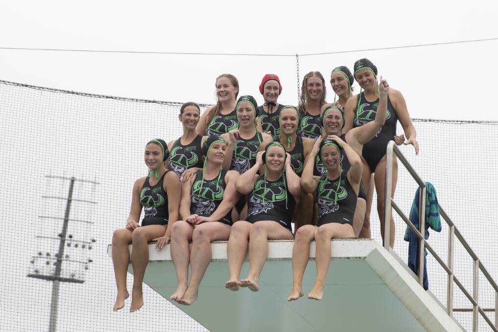 VICTORS: The Raiders water polo team posing for a victory shot after winning last Saturday's women's A-grade grand final. Picture: Madeline Begley