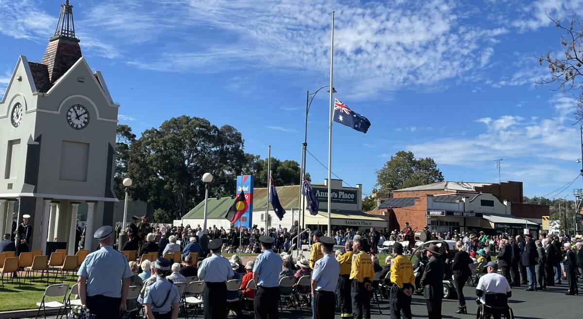 RESPECT: Locals gathered around the Junee Cenotath to pay their respects to Australia's service men and women. Picture: Tim Piccione