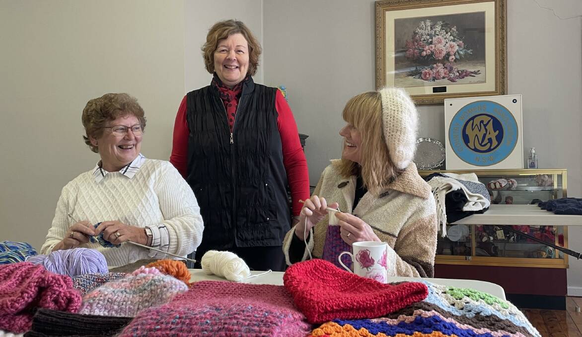 Kathy Campbell (left to right), Cheryl Honey and Maria McNuff joined other CWA members yesterday to knit and crochet for Wagga's homeless community. Picture: Tim Piccione