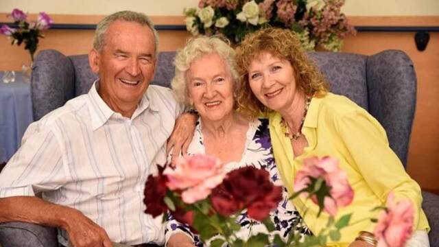 Mrs Hickey with children Christine and Michael, celebrating her 100th birthday. Picture: Contributed