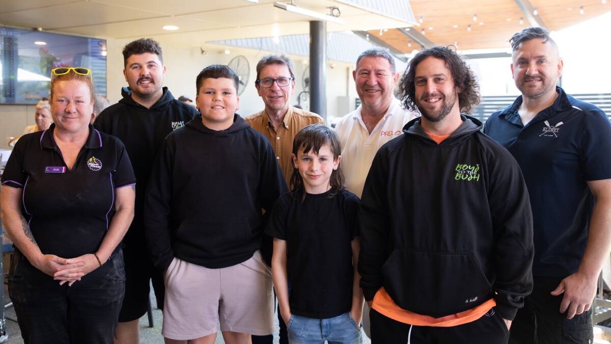 Planet Fitness Wagga general manager Sandy Ward (left to right) volunteering her staff, Boys to the Bush (BTTB) mentor Trey Charles and 14-year-old cousin and BTTB mentee Jerrell Mitchell, state MP Joe McGirr, 10-year-old BTTB mentee Kaiden Hinch, PRD volunteer Mark Steel, BTTB mentor Rogan Price and The Blamey Hotel events and functions manager Robert Boyland at a barbecue raising money and awareness on Sunday. Picture by Madeline Begley