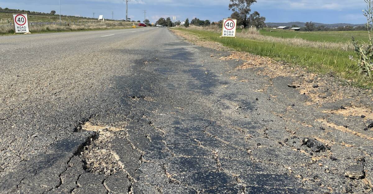 A 40km/h speed limit remains in place along a section of infamous pothole hotspot OId Narrandera Road following recent patching of the road's surface. Picture by Tim Piccione