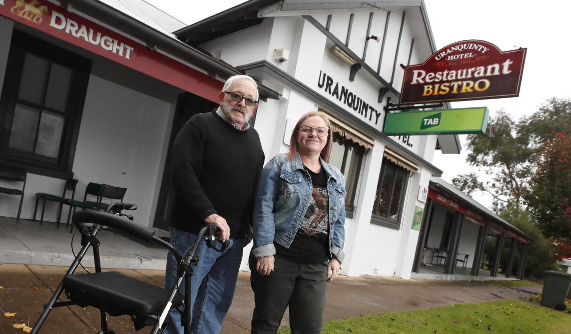 Uranquinty residents Susan Colley and her father Michael Godfrey-Roberts normally join the village every Wednesday night for dinner and a raffle. Picture: Les Smith 