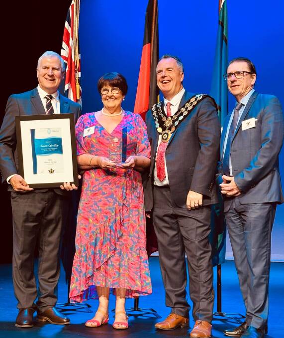 Member for Riverina Michael McCormack, 2024 Wagga Citizen of the Year Annette St Clair, Wagga mayor Dallas Tout and Member for Wagga Joe McGirr at the special Australia Day awards night at the Civic Theatre on Thursday. Picture contributed