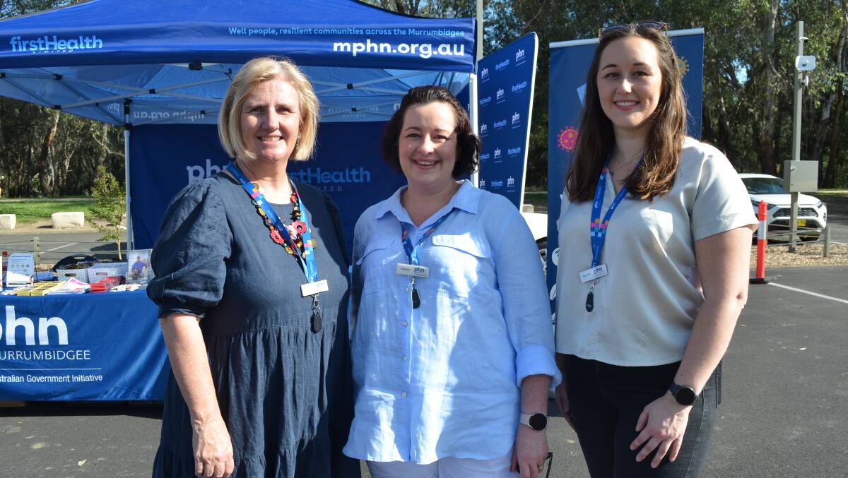 MPHN's clinical programs and emergency response manager Peta Anderson, suicide prevention lead Emma Bromham and strategic project manager Amelia Dixon were at Wagga Beach to coincide with the Foodbank delivery on Wednesday morning. Picture by Andrew Mangelsdorf