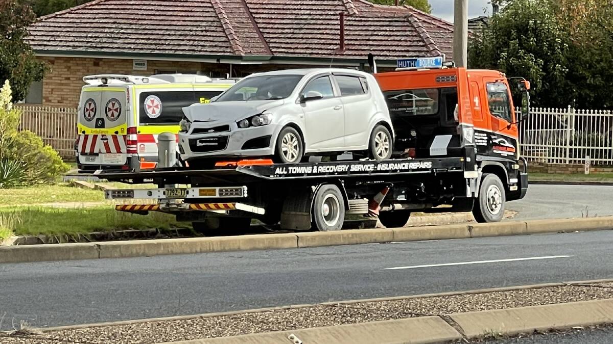 LUCKY ESCAPE: One of the vehicles involved in the crash is loaded onto a tow-truck ready to be taken away. Picture: Taylor Dodge