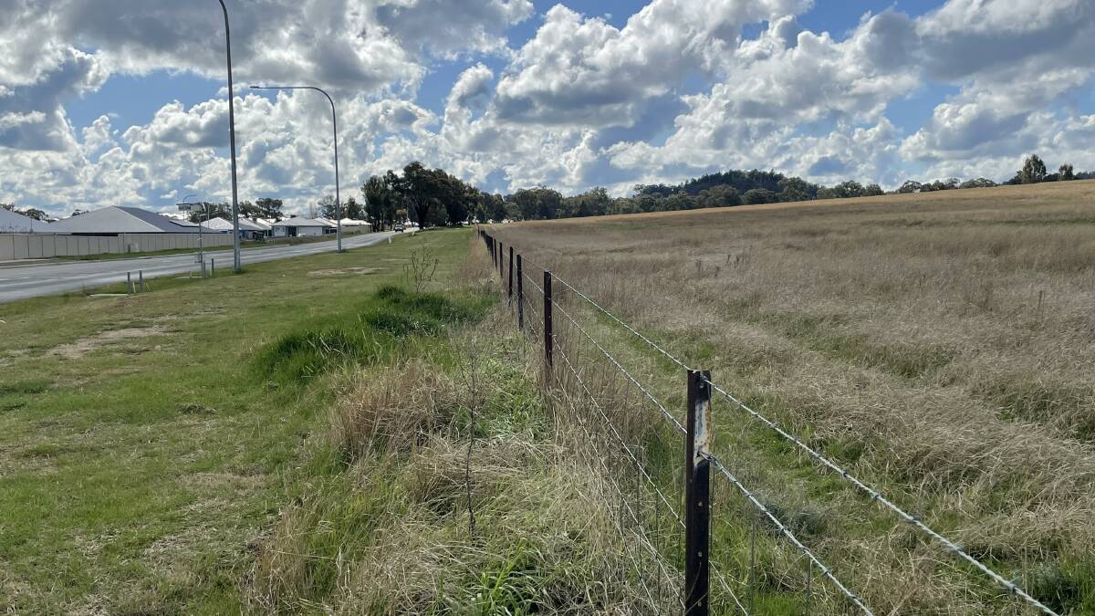 MISSING LINK: The proposed expansion to Estella Estate will connect the suburb with neighbouring Gobbagombalin, pictured above on Pine Gully Road. 