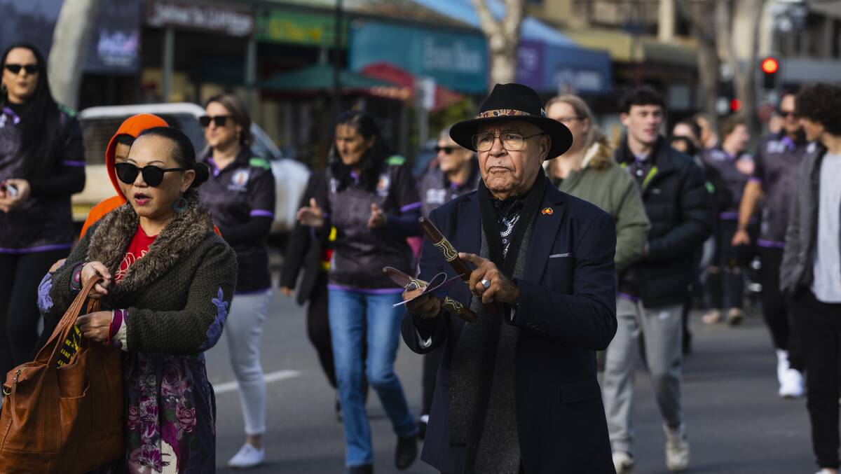 Indigenous Elder Uncle Hewitt Whyman helps lead the NAIDOC Week march down Baylis Street on Monday. Picture by Ash Smith