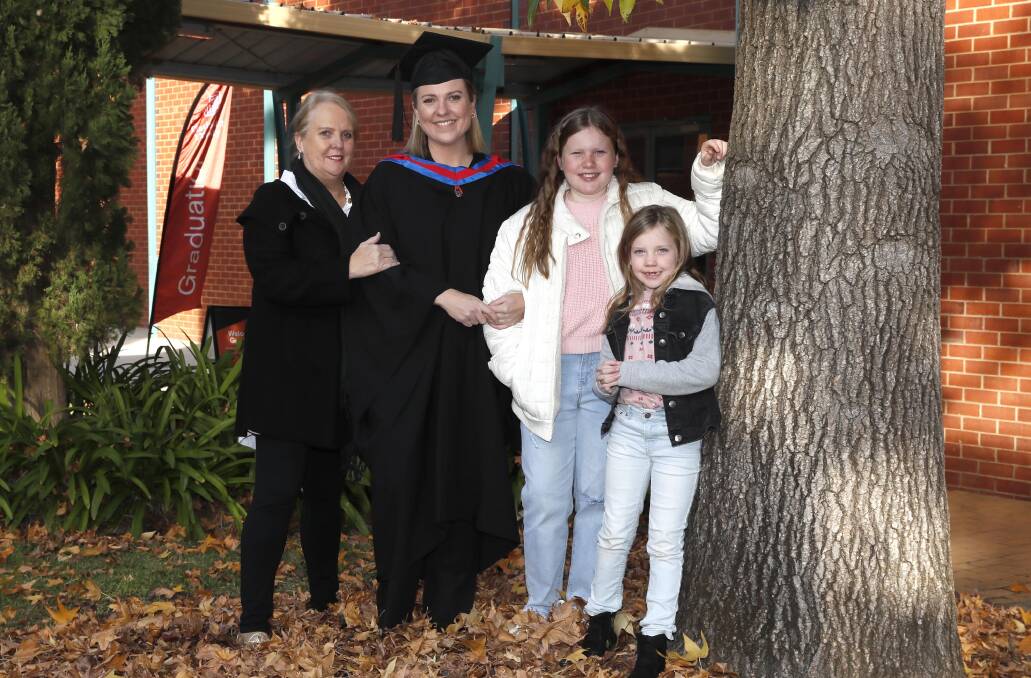 FAMILY AFFAIR: Jeanette Griggs with her daughter Katie Trebley (Graduate Certificate in Business Administration), Georgia Trebley and Evelyn Trebley. Pictures: Les Smith