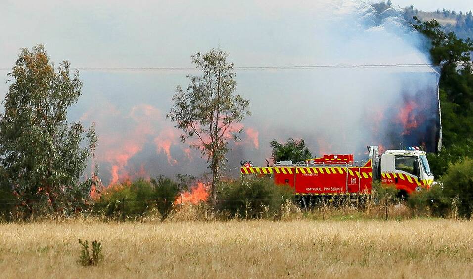 A haystack is continuing to burn in Wagga's west after it caught fire last week. Picture by Les Smith