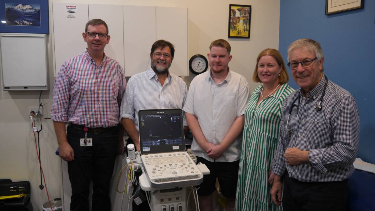 Mark Taylor, Wagga paediatrician John Preddy, Oliver Taylor and mum Cathrine with Dr Stephen Cooper. Picture by Andrew Mangelsdorf