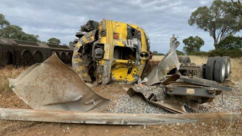 A man has faced court this week after a train was derailed at a level crossing east of Marrar when it collided with a truck in March. Picture by NSW Ambulance