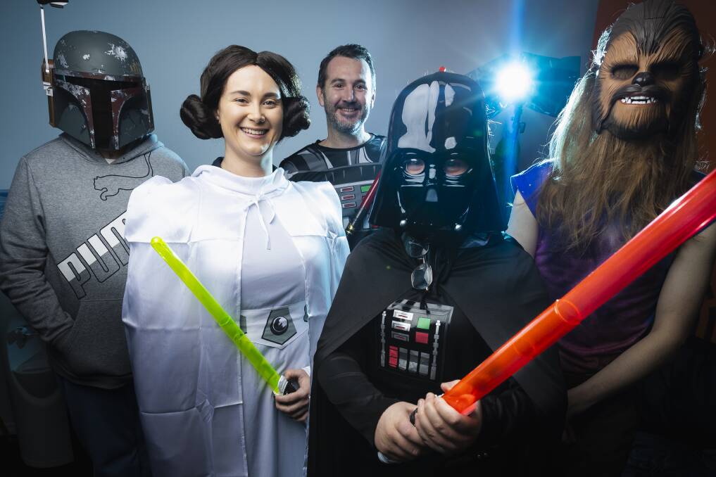 Cooper Shlockley, 17, Indie School assistant head Annie Watson, executive principal David Pickett, Alex Franke, 14, and CJ Dedman, 17 , make the most of May the 4th. Picture by Ash Smith
