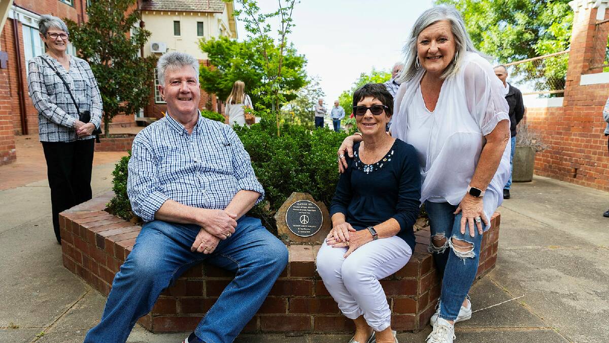 Wagga High Class of 1971 reunion organisers Jack Nott, Liz Anschaw and Lyn Bradley at a plaque unveiling at their school on Saturday afternoon. Picture by Ash Smith