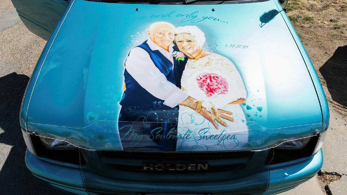 As a tribute to his late wife Di, Michael Henderson has had a portrait of them airbrushed on his 1999 Holden Rodeo show car. Picture by Ash Smith