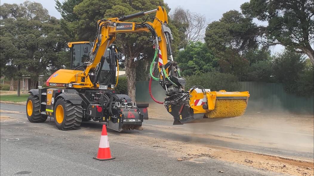 The JCB Pothole Pro removing potholes from a stretch of Vincent Road in Lake Albert on Wednesday morning. Picture by Andrew Mangelsdorf