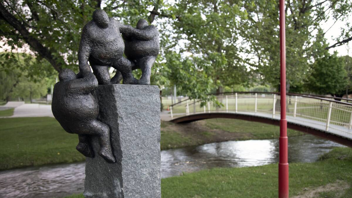 STATUE: Danish artist Keld Moseholm's 'Together We Are Strong' sculpture located by the Tumbarumba river. Picture: John Riddell